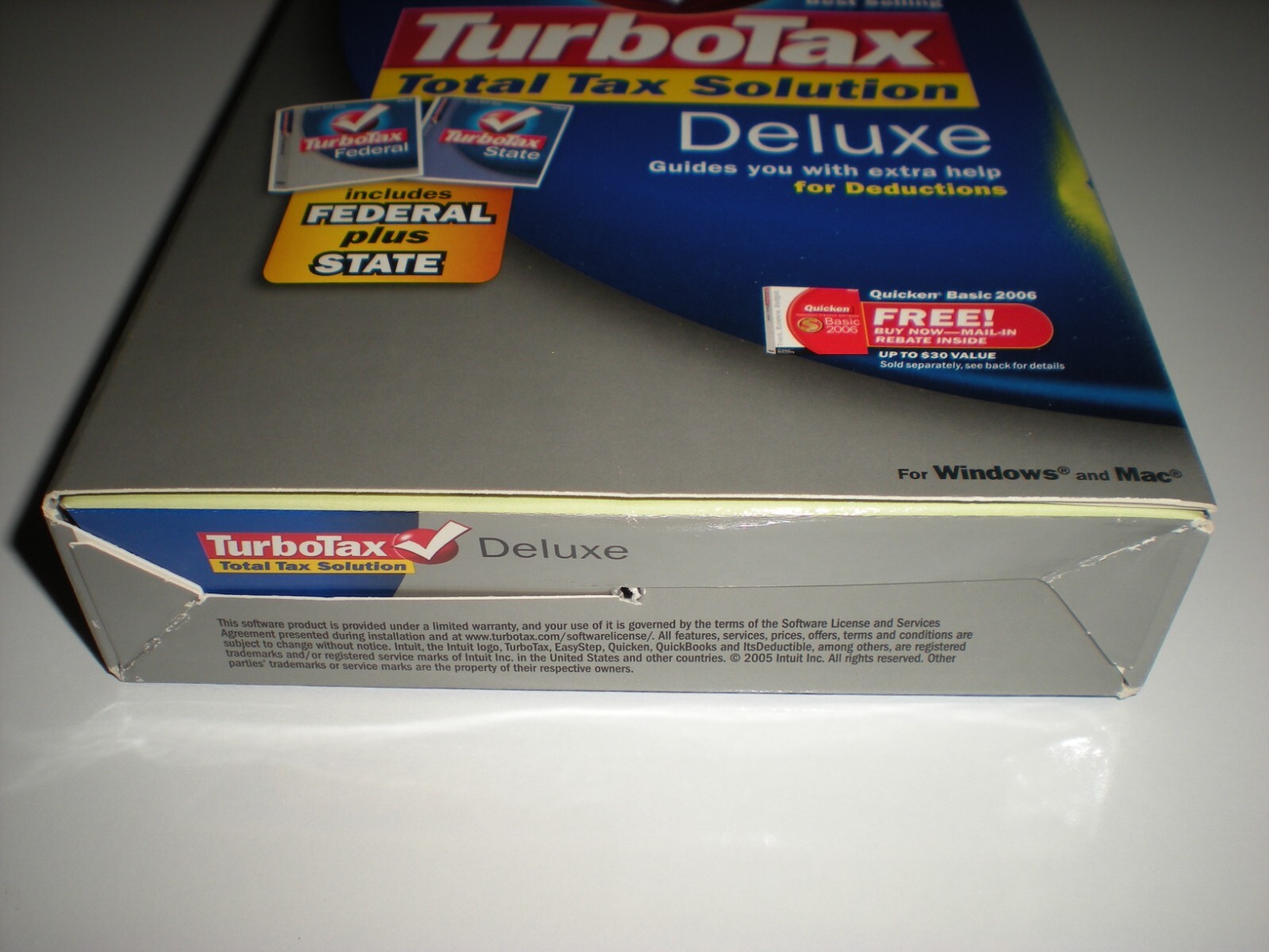 Turbotax 2005 Deluxe + state. New in box. Genuine but blemished package.